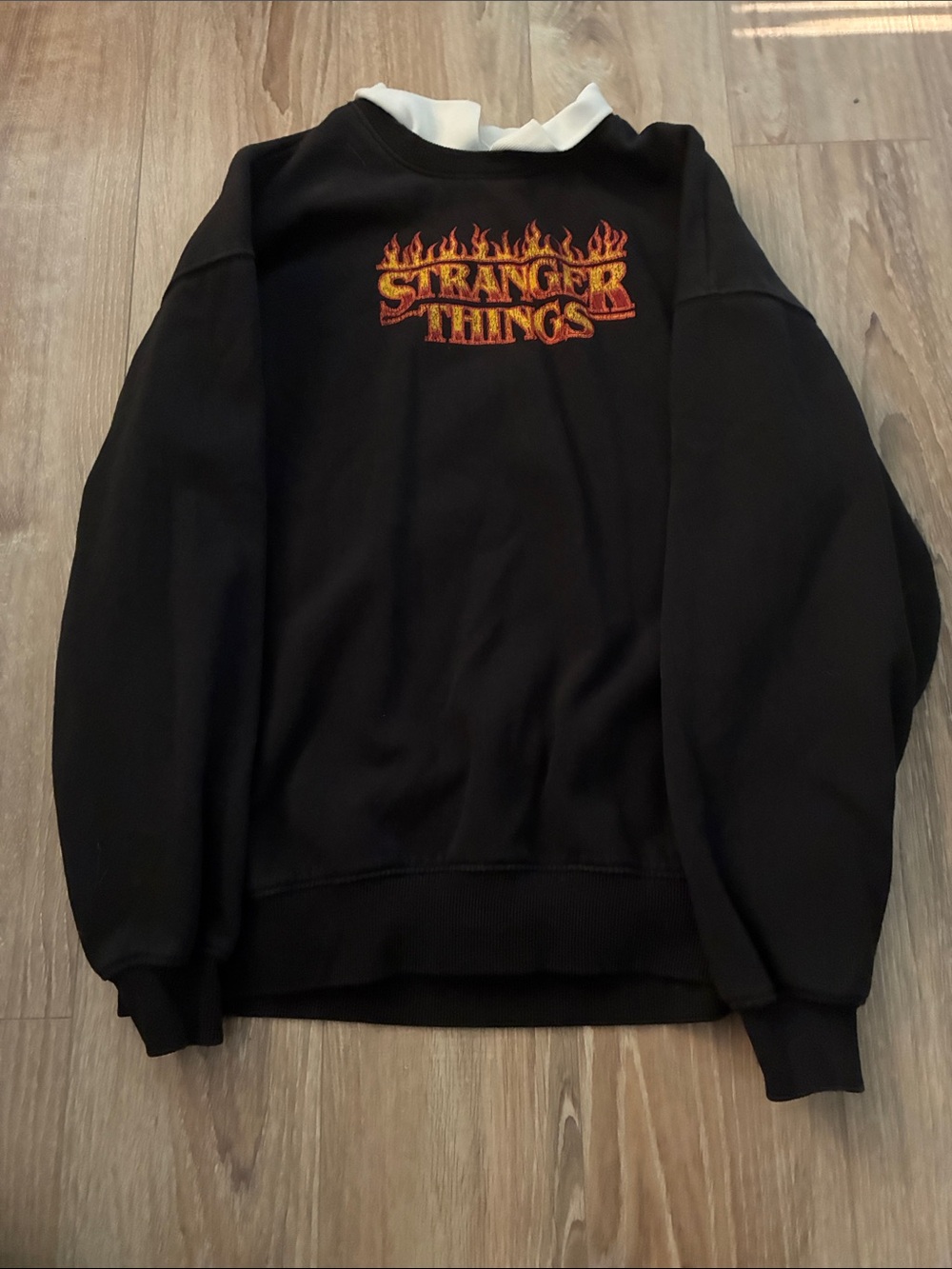 H&M Black Stranger Things Sweatshirt with Red and Orange Flame Logo